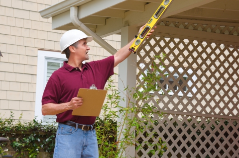 contractor pointing at roof