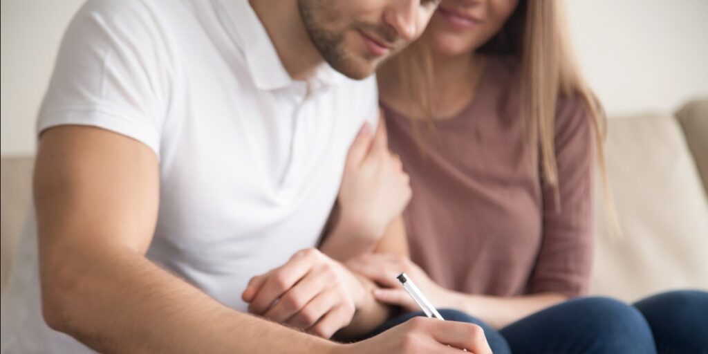 couple signing