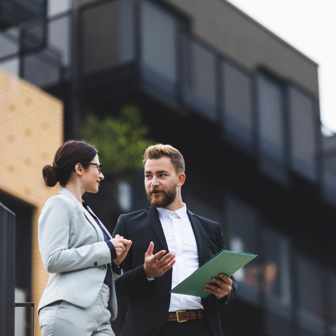 Real estate agent showing a home to a client. 