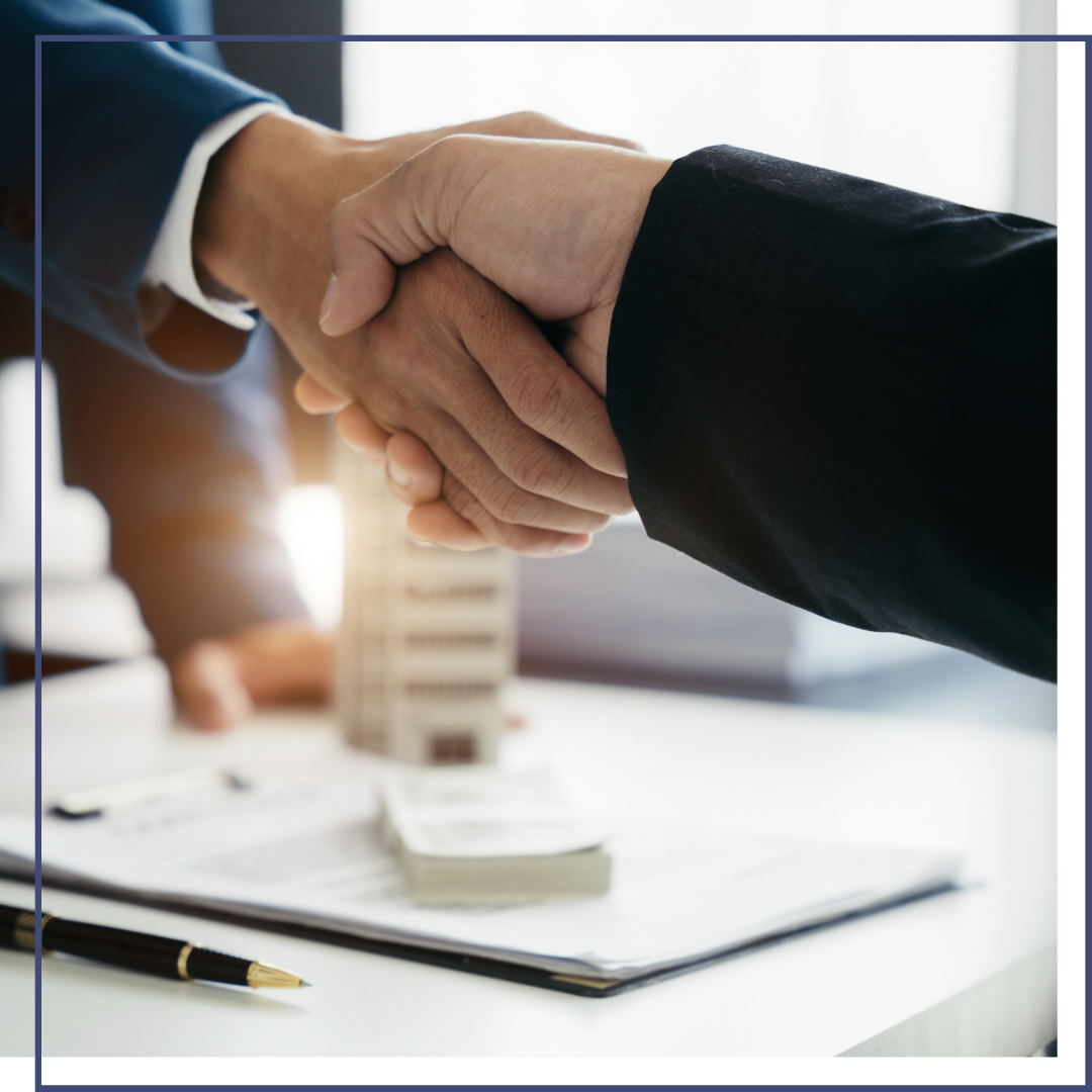 Shaking hands real estate agent