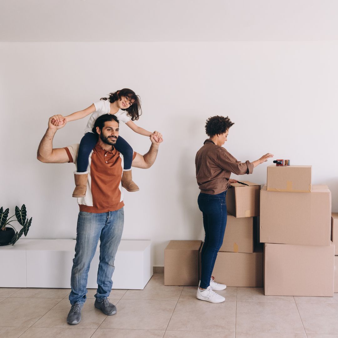 family with moving boxes